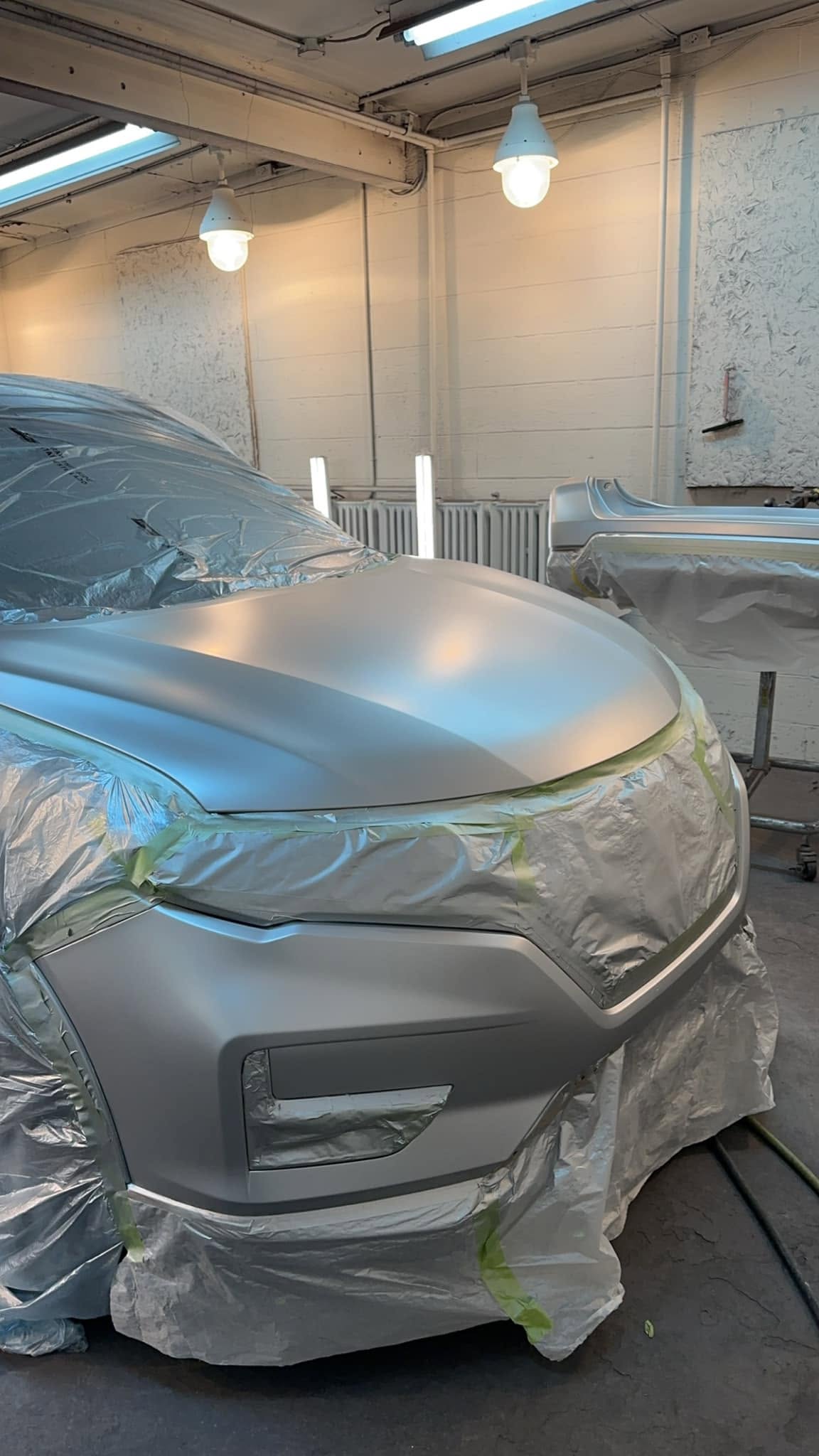 SUV primed and prepped for full respray